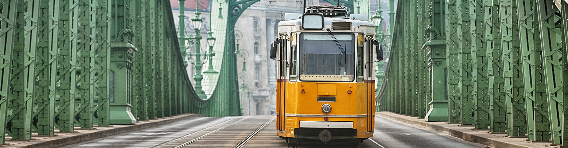 Yellow tram on bridge